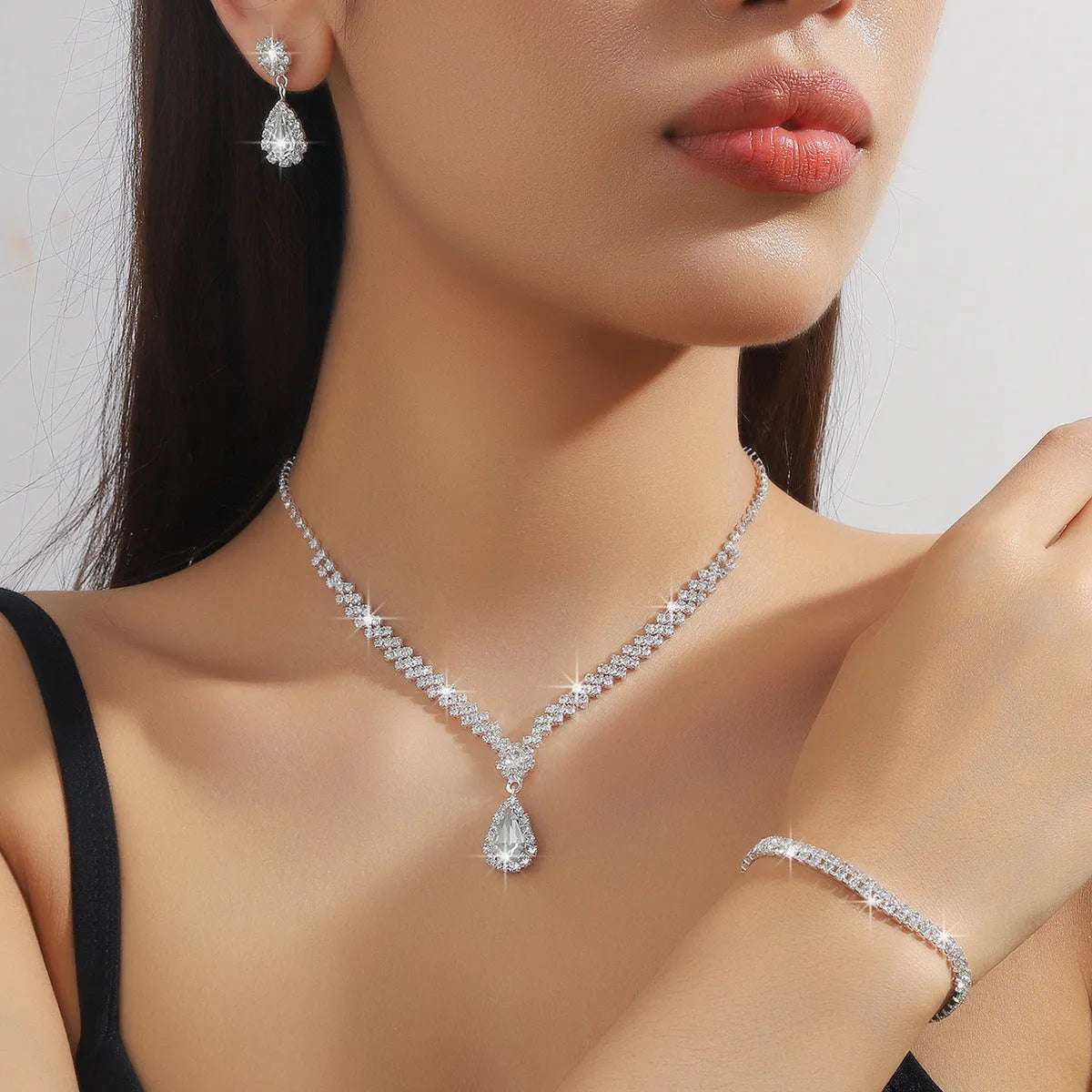 Claw chain necklace and earrings set with drop rhinestones in multiple colour options