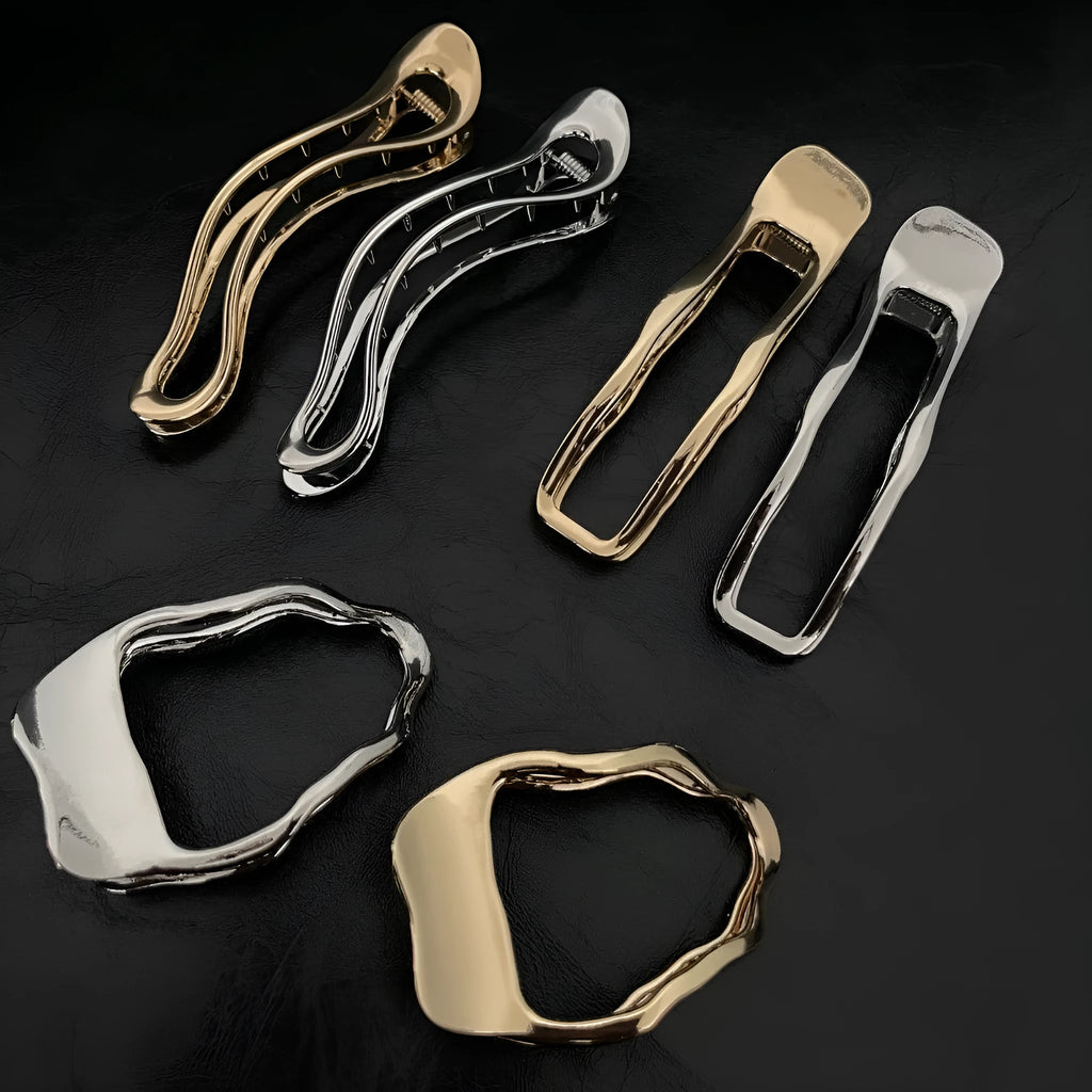 Women's zinc alloy hair barrette in gold colour with triangle shape