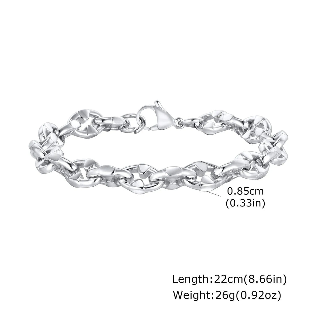 A thick handmade stainless steel bracelet with a geometric shape and steel colour finish.
