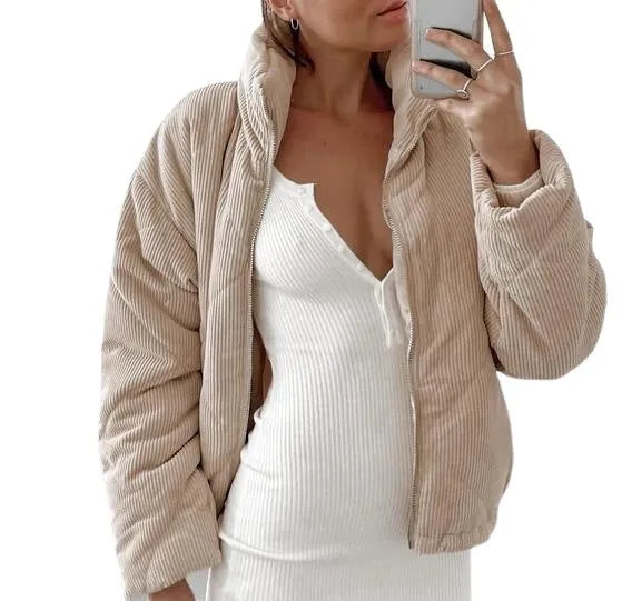 Apricot coloured women's corduroy jacket with a stand collar and zip-up front.
