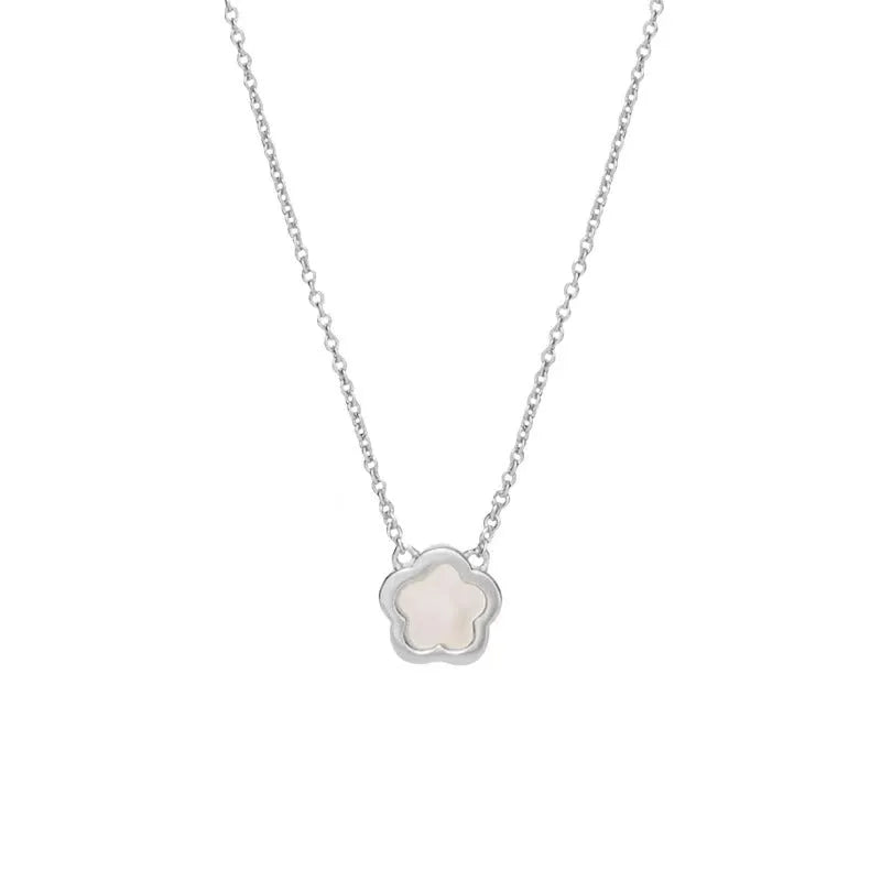 White mother-of-pearl flower necklace with floral pendant on chain