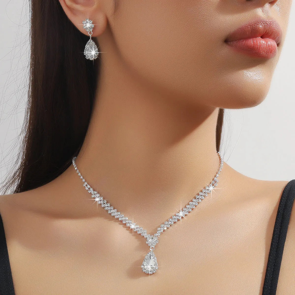 Claw chain necklace and earrings set with drop rhinestones in multiple colour options
