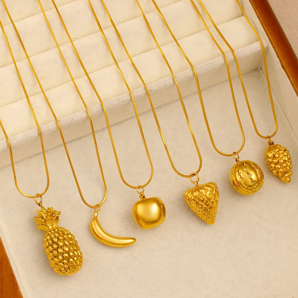Stainless steel women's necklace with a small colourful fruit pendant on a regular chain.