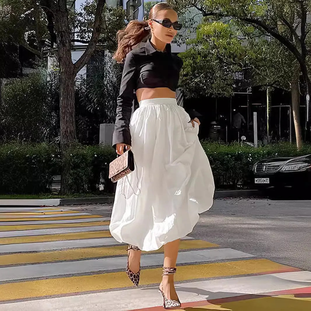 Women's solid colour cotton long skirt with elastic waistband in white or black options