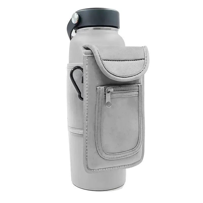 Fitness magnetic water bottle sleeve in black with a carabiner clip, shown on a sports bag.
