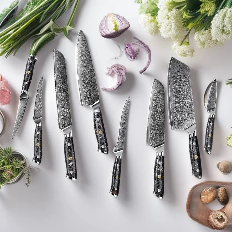 Eight-piece Damascus steel kitchen knife set showing fishbone pattern blades on a wooden surface.