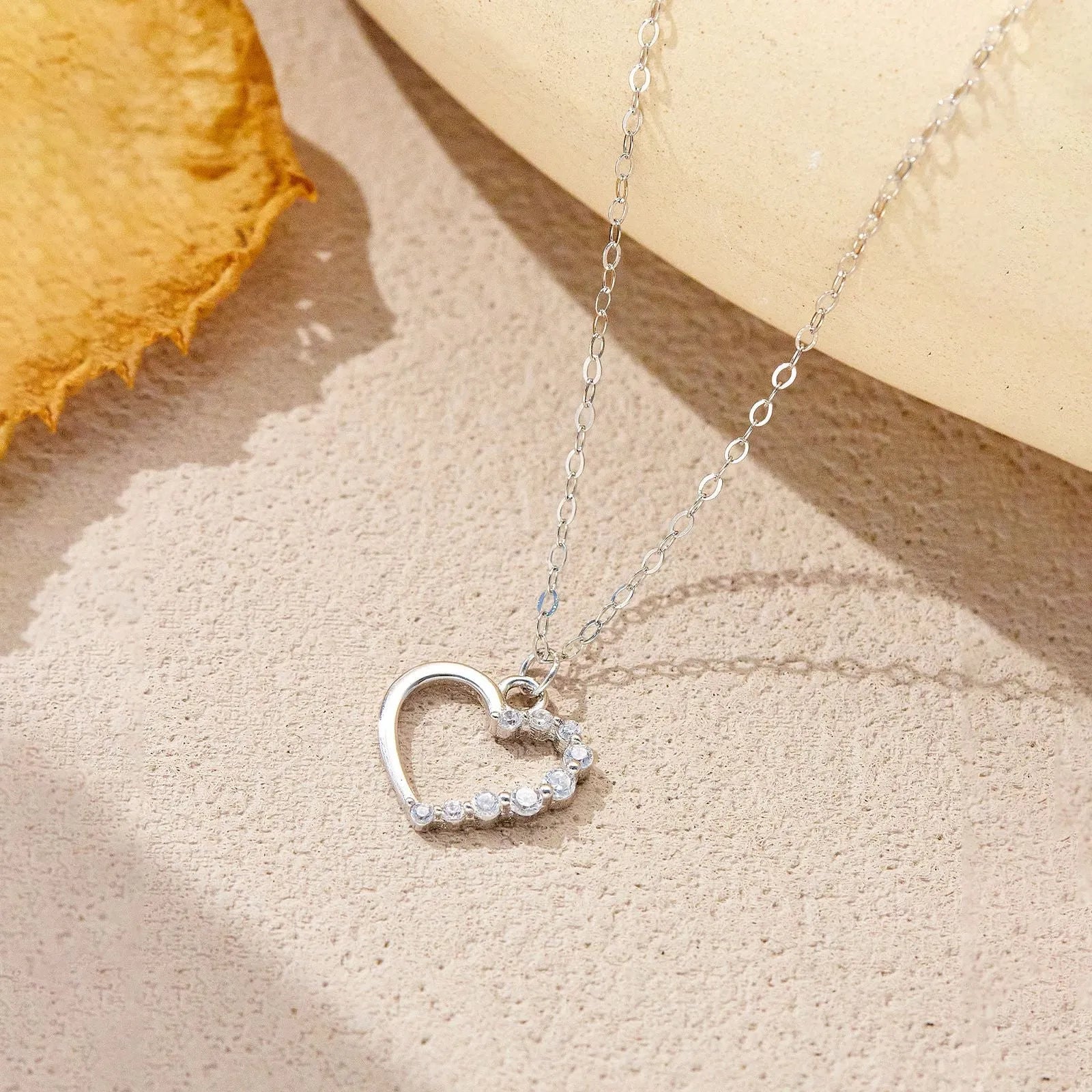 S925 sterling silver necklace with hollow heart pendant in gold or platinum colour finish