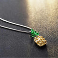 Silver geometric women's necklace with a pineapple and diamond motif pendant.