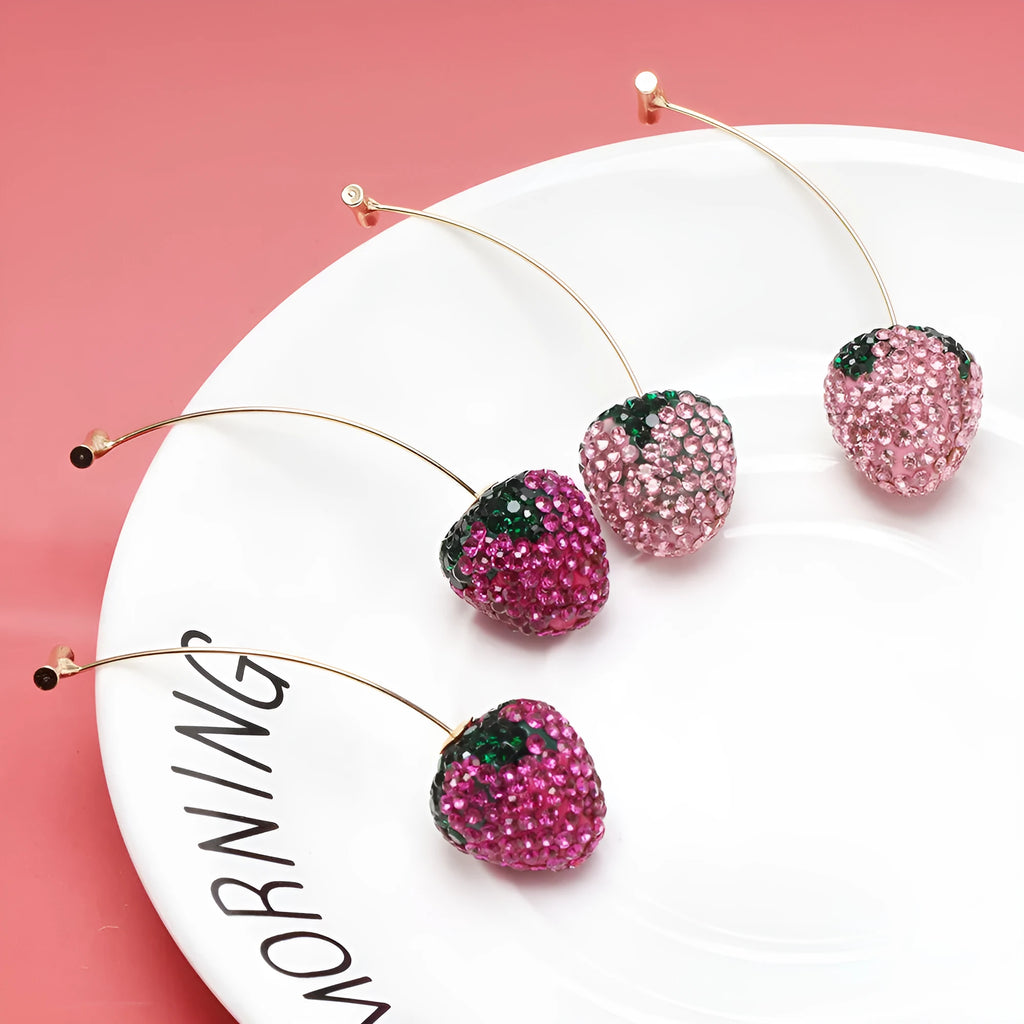 Geometric red strawberry stud earrings with spot drill texture on a zinc alloy post.
