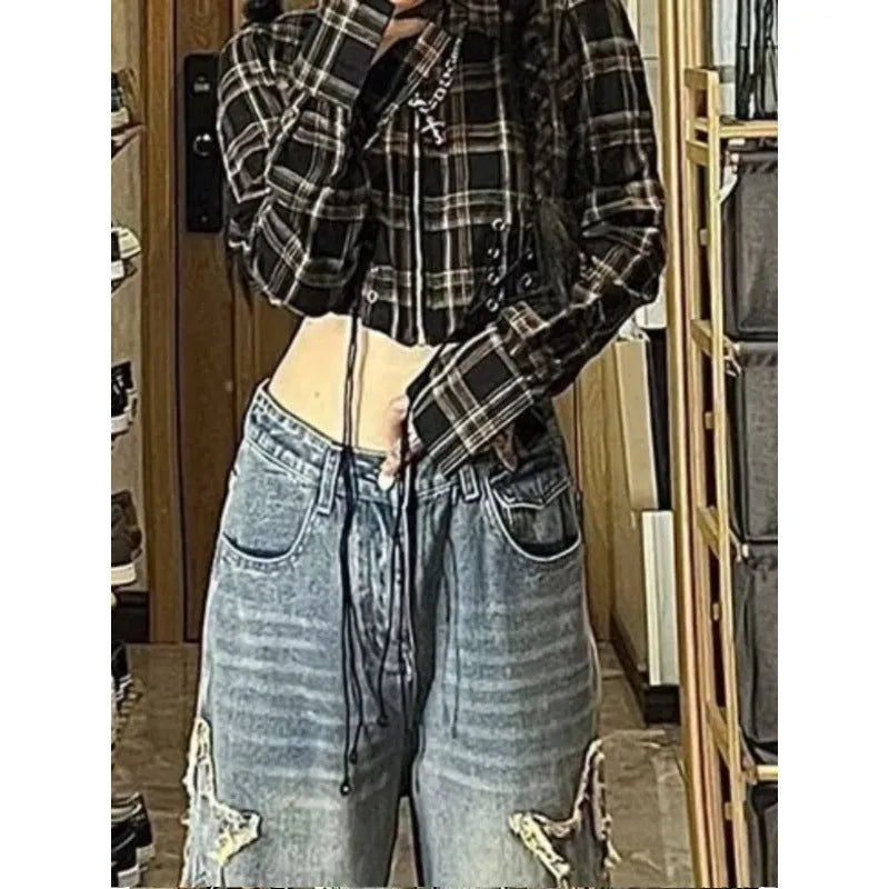Blue high-waisted straight-leg women's jeans on a hanger, showing the front and back design.