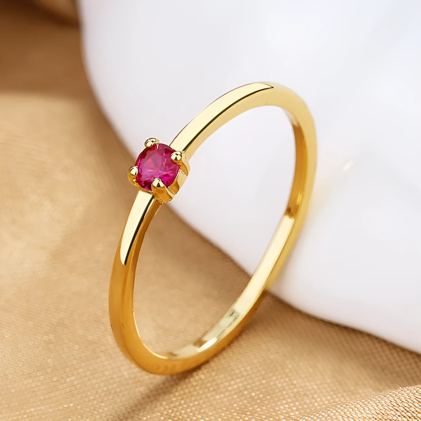 Geometric copper women's ring with single diamond in circle design, shown in available colours.