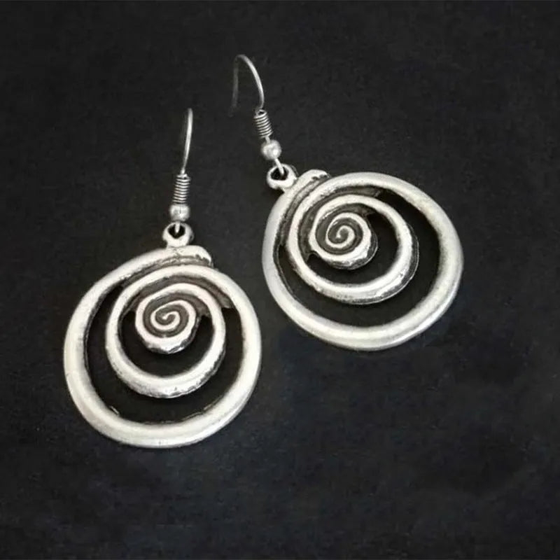 Silver geometric spiral distressed earrings with tribal design measuring 2.6 by 5 cm