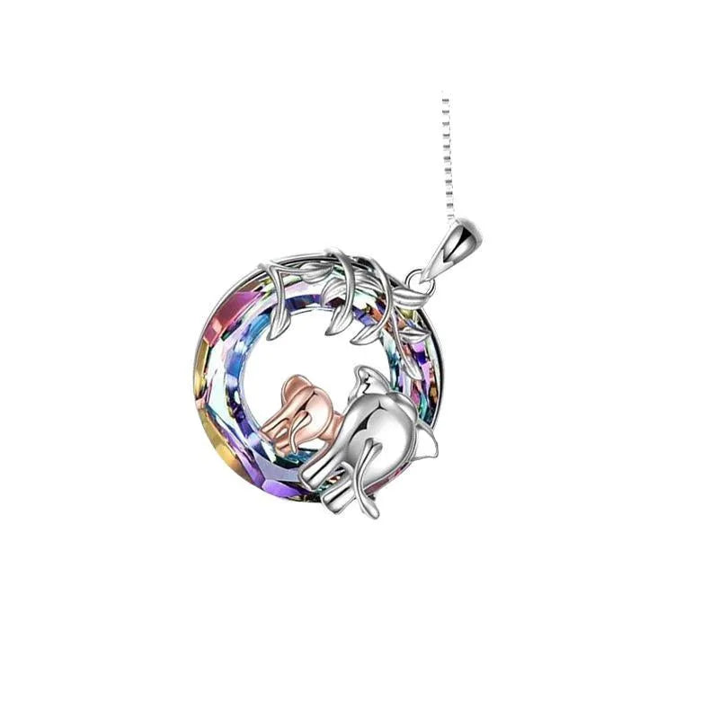 Platinum coloured women's necklace with geometric Saturn pendant on adjustable 51cm-80cm chain.