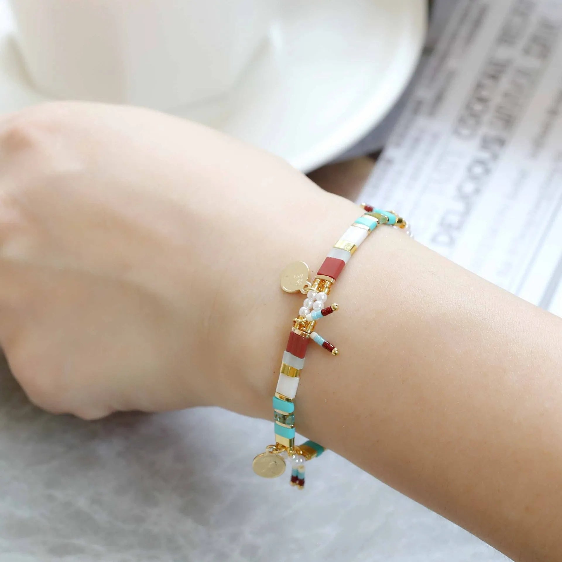 Women's handmade bracelet with imitation pearls and glass beads in six colour variations