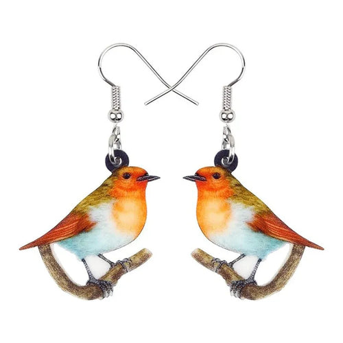 Blue Titmouse and snake motif acrylic drop earrings with geometric pendant shape on a white background.