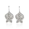 Silver alloy hollow flower leaf-shaped women's earrings with retro floral metal design