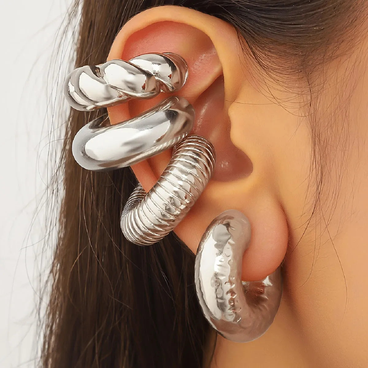 Geometric ear clips for women without pierced ears in gold and silver colours