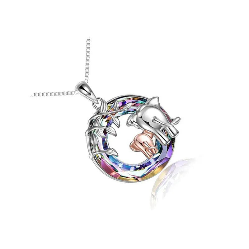 Platinum coloured women's necklace with geometric Saturn pendant on adjustable 51cm-80cm chain.