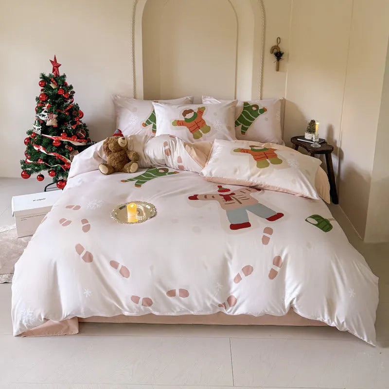 Christmas cartoon character bedding set with duvet cover, fitted sheet and pillowcases laid on a bed