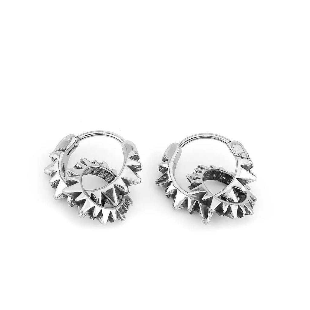 A pair of simple stainless steel round hoop earrings with a polished finish in a steel colour.