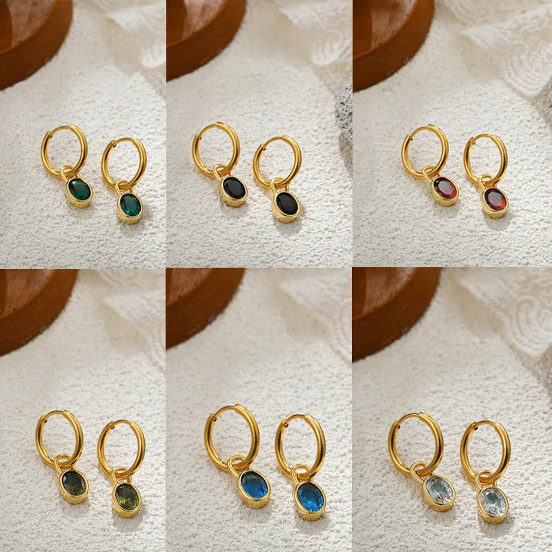 Women's retro oval zircon drop earrings in copper, shown in army green colour.