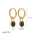 A pair of women's retro oval zircon drop earrings in a copper setting on a white background.