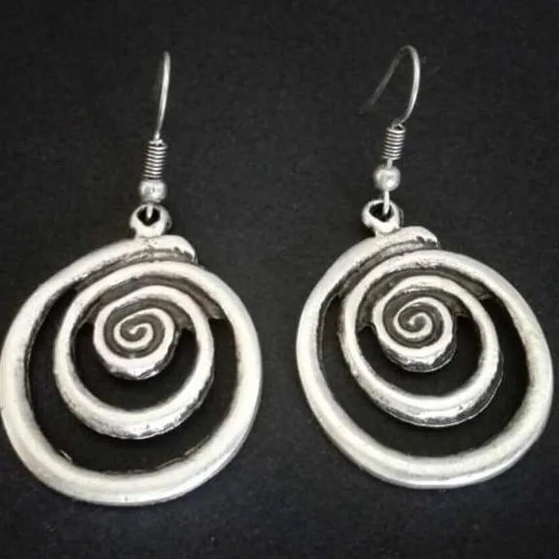 Silver geometric spiral distressed earrings with tribal design measuring 2.6 by 5 cm