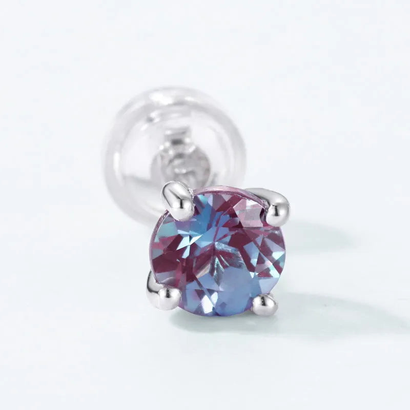 A pair of women's geometric ear studs with a round cultivated Alexander stone set in 925 silver.