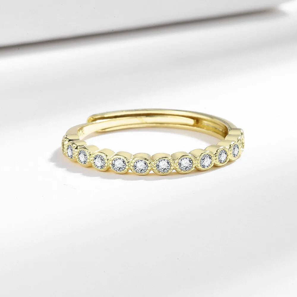 Geometric open-mouth women's ring with diamond tail detail in white gold or yellow gold colour finish.
