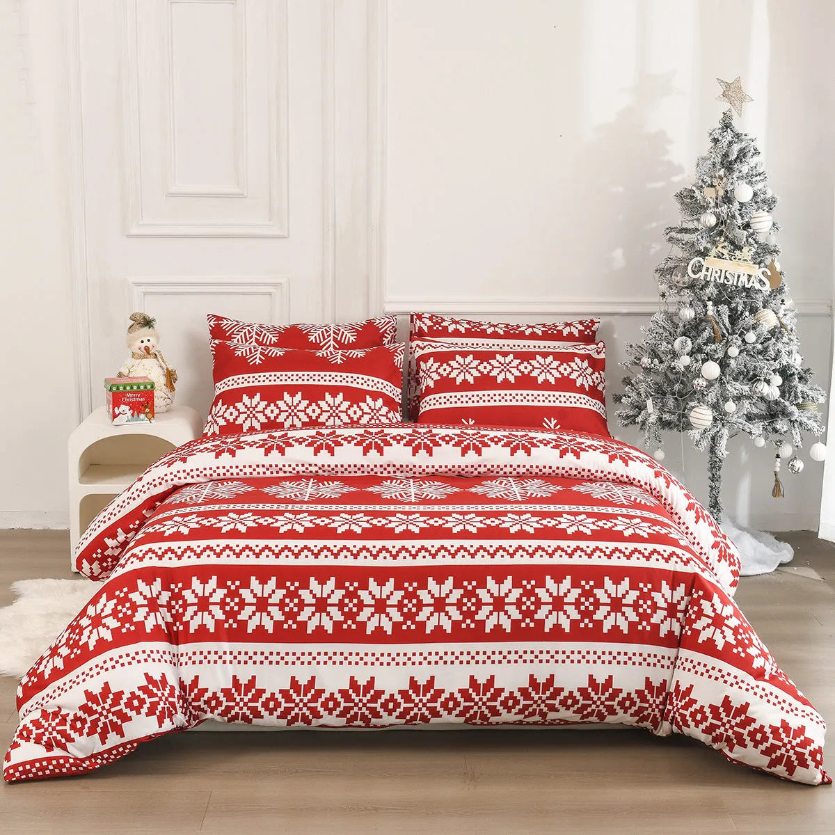 Red Winter Sleepers quilt cover with Christmas Love Song pattern, folded with matching pillowcases.