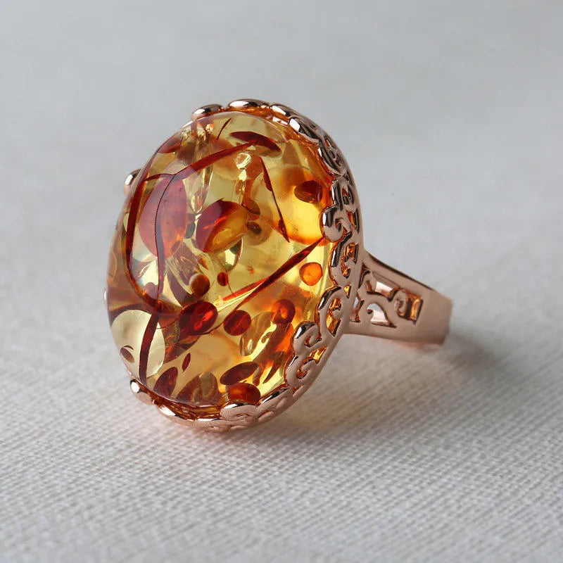 Amber beeswax ring with New Amber Type A colour and ethnic style design on alloy band
