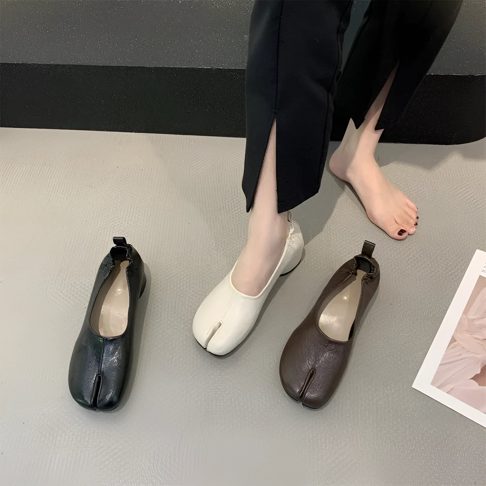 Women's apricot coloured chunky heel pumps with split toe horseshoe detail and round toe.