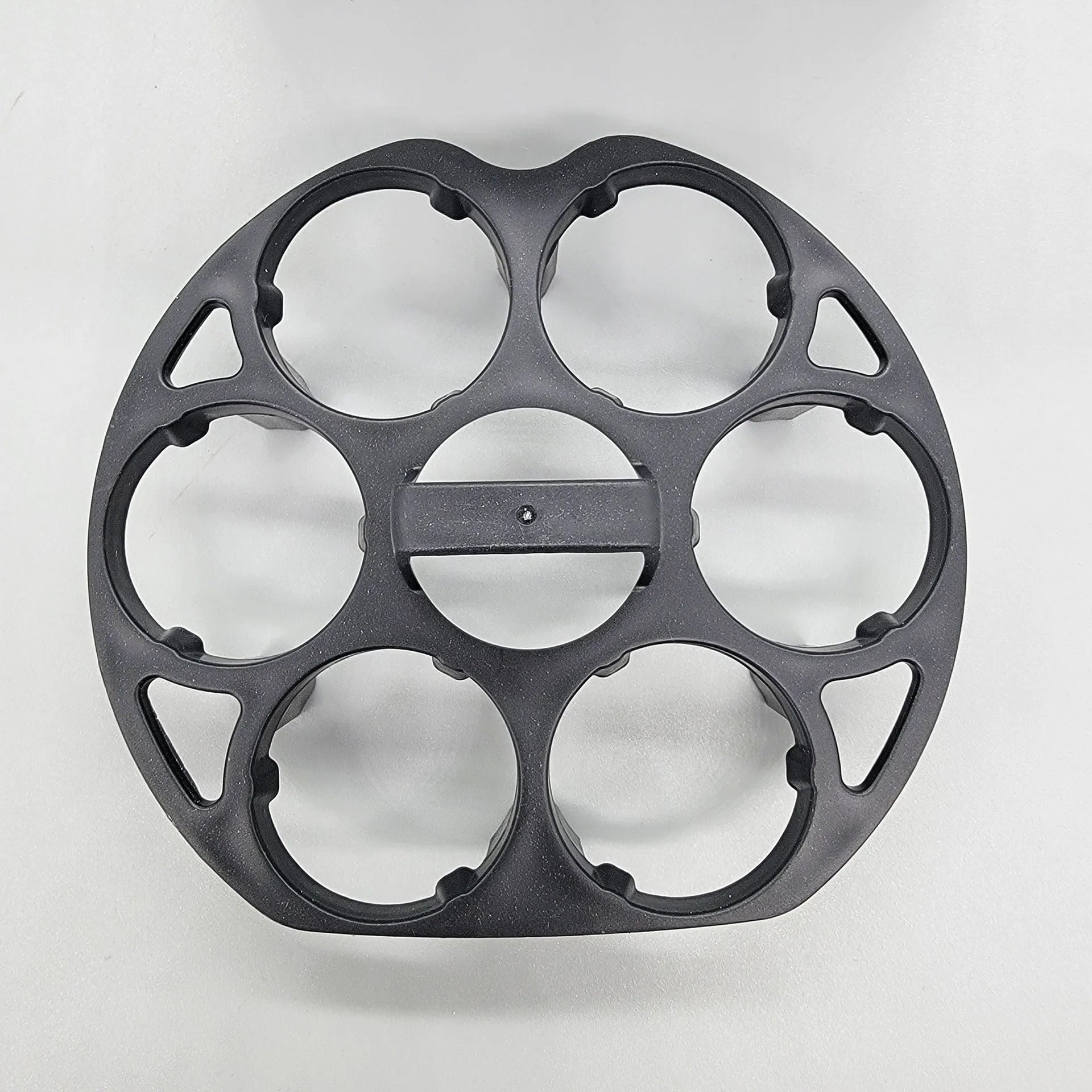 Black plastic egg holder rack measuring 13.8 by 12.6 cm for kitchen organisation