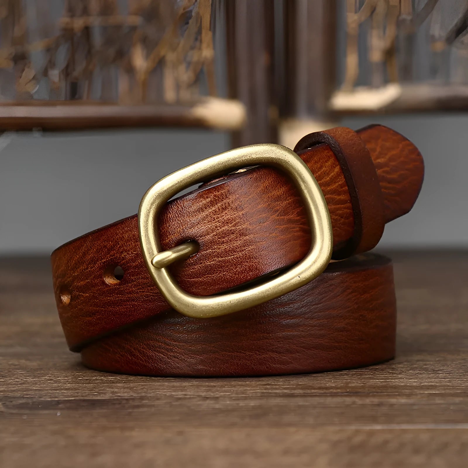 Handmade vintage-style women's leather belt with copper buckle in brown.