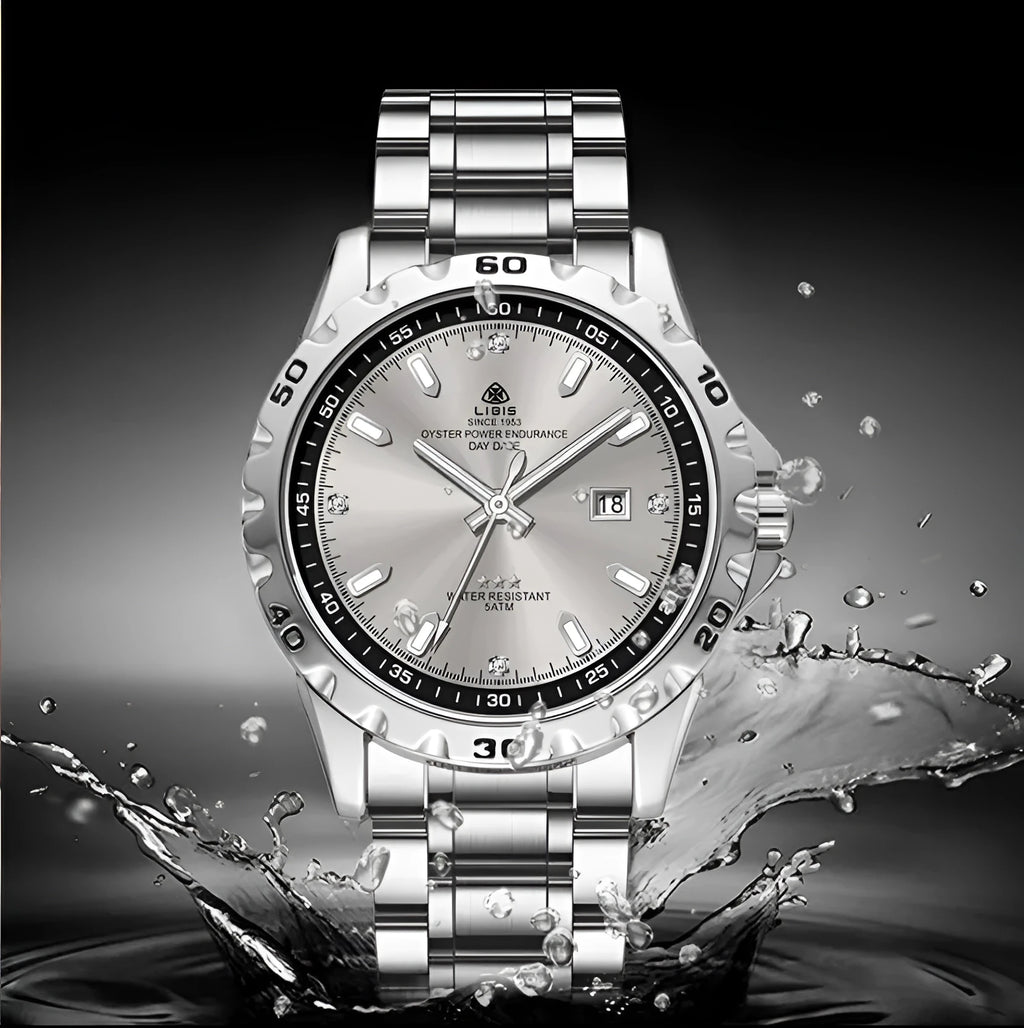 Silver men's quartz watch with luminous hands and stainless steel strap on wrist