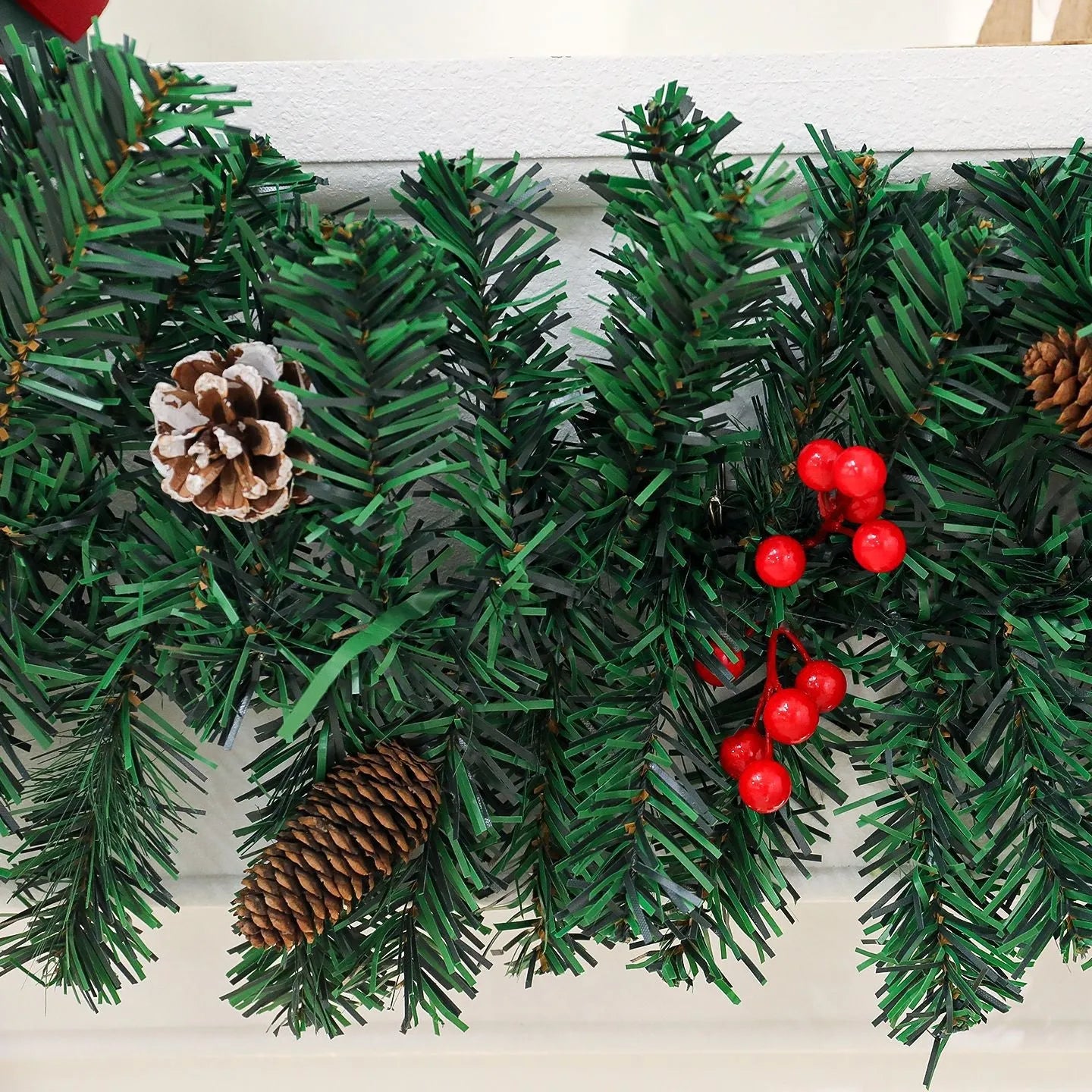 PVC Christmas rattan decorative cane with pine cone and bow motif in European style modern art design