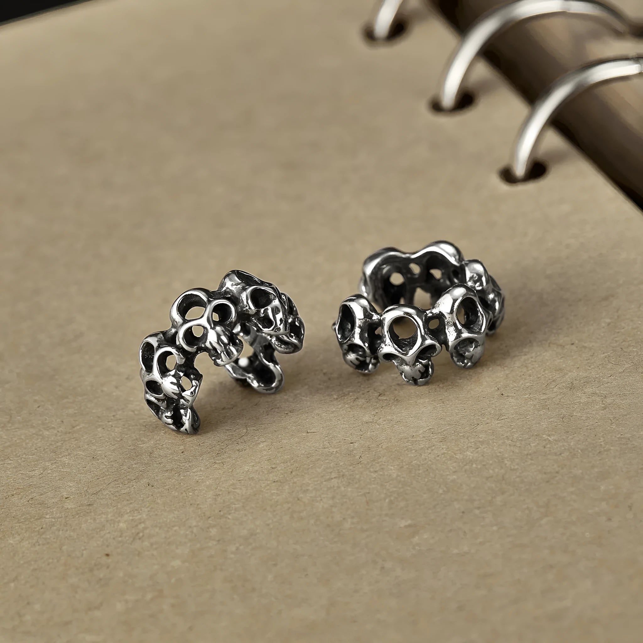 Stainless steel hollow skull ear clip earrings with geometric shape and retro design