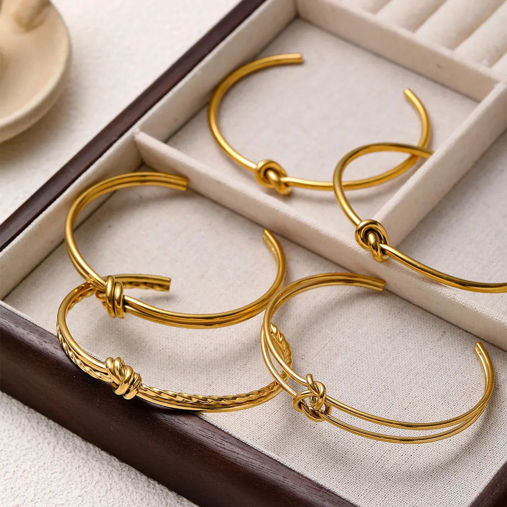 Women's adjustable stainless steel bracelet with knotted C-shaped open design and double-layer construction