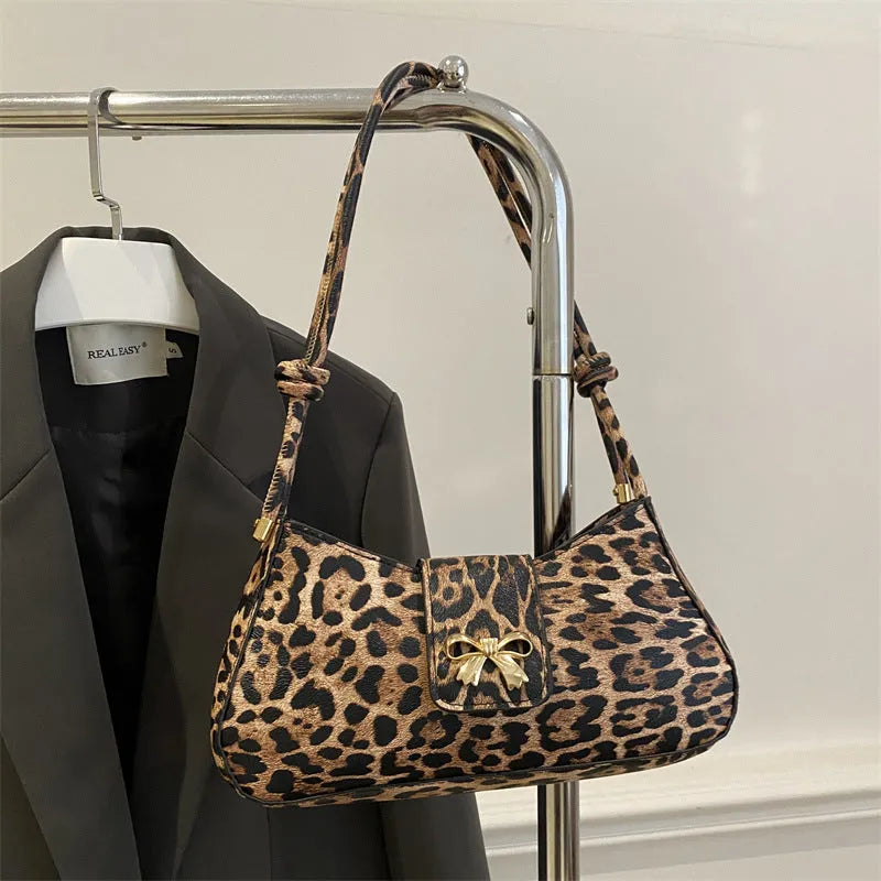 Women's large casual PU leather shoulder handbag with sandwich pocket in khaki colour.