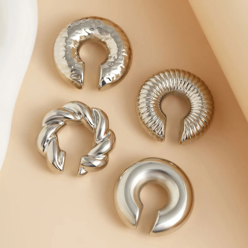 Geometric ear clips for women without pierced ears in gold and silver colours
