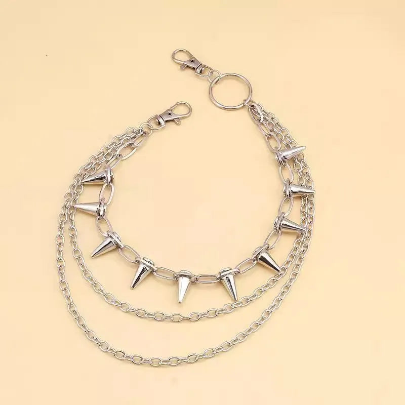 Silver metal waist chain with punk rivet decoration and zipper fastening, showing double layered construction