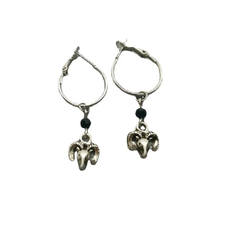 Silver-coloured alloy round ring earrings for women with a Tibetan antelope design.