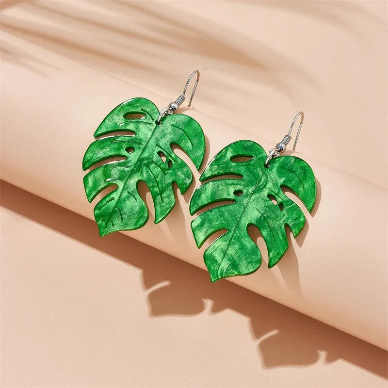 Acrylic drop earrings with coconut and jackfruit design on the ear hook in one of five styles.