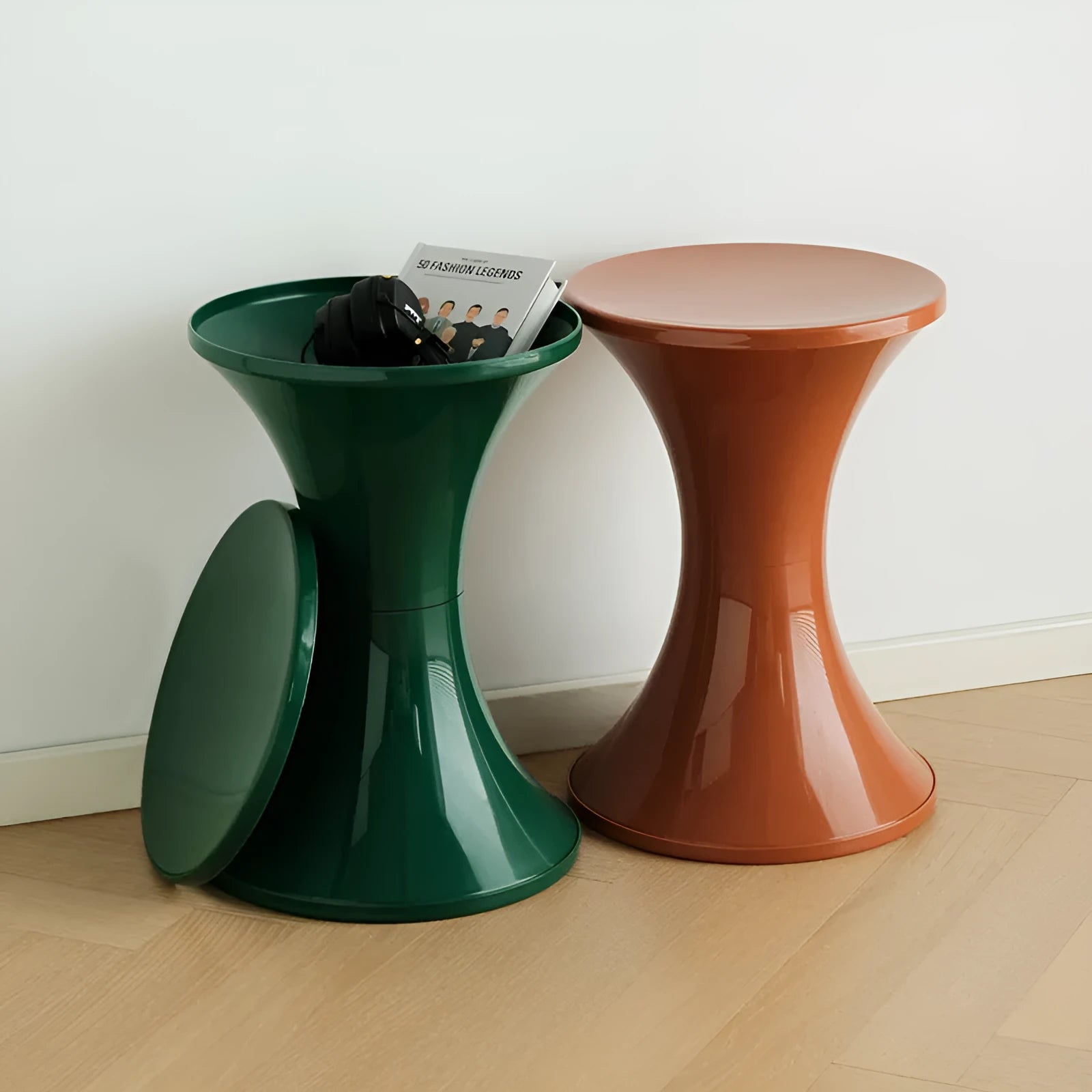 A plastic hourglass-style shoe changing stool in one of five available colours.