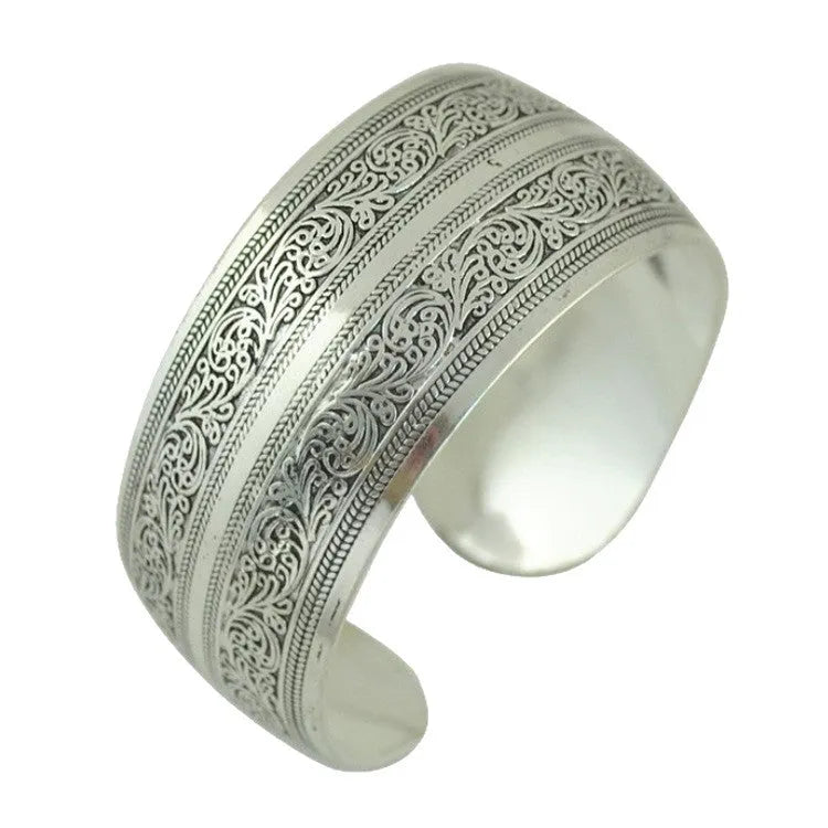 Ethnic carved open Miao silver bracelet with Roman shape and detailed openwork pattern