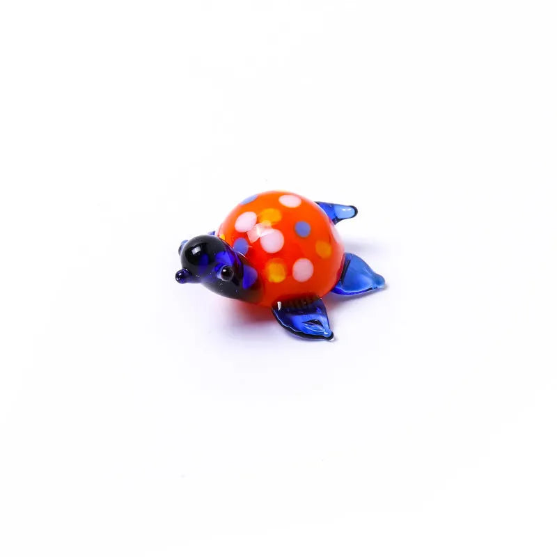 Geometric glass turtle ornament in modern simplicity style with hand-painted details