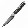 Eight-piece Damascus steel kitchen knife set showing fishbone pattern blades on a wooden surface.