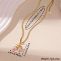 Stainless steel strawberry pendant necklace on an alloy chain in red or white powder gradient.