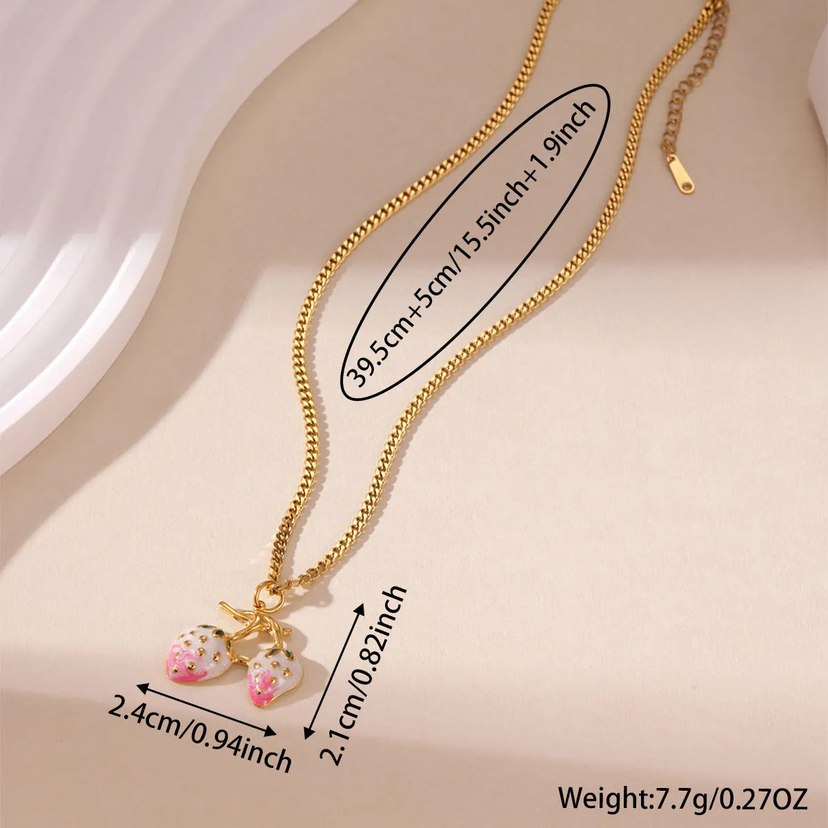 Stainless steel strawberry pendant necklace on an alloy chain in red or white powder gradient.