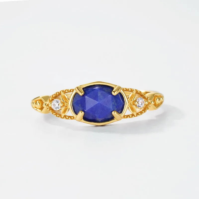 Women's geometric ellipse lapis lazuli ring on a silver alloy band, showcasing Japanese-inspired design.
